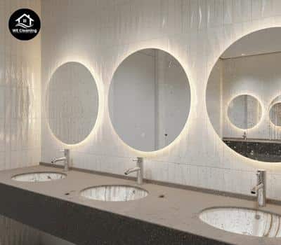 Modern office restroom before cleaning